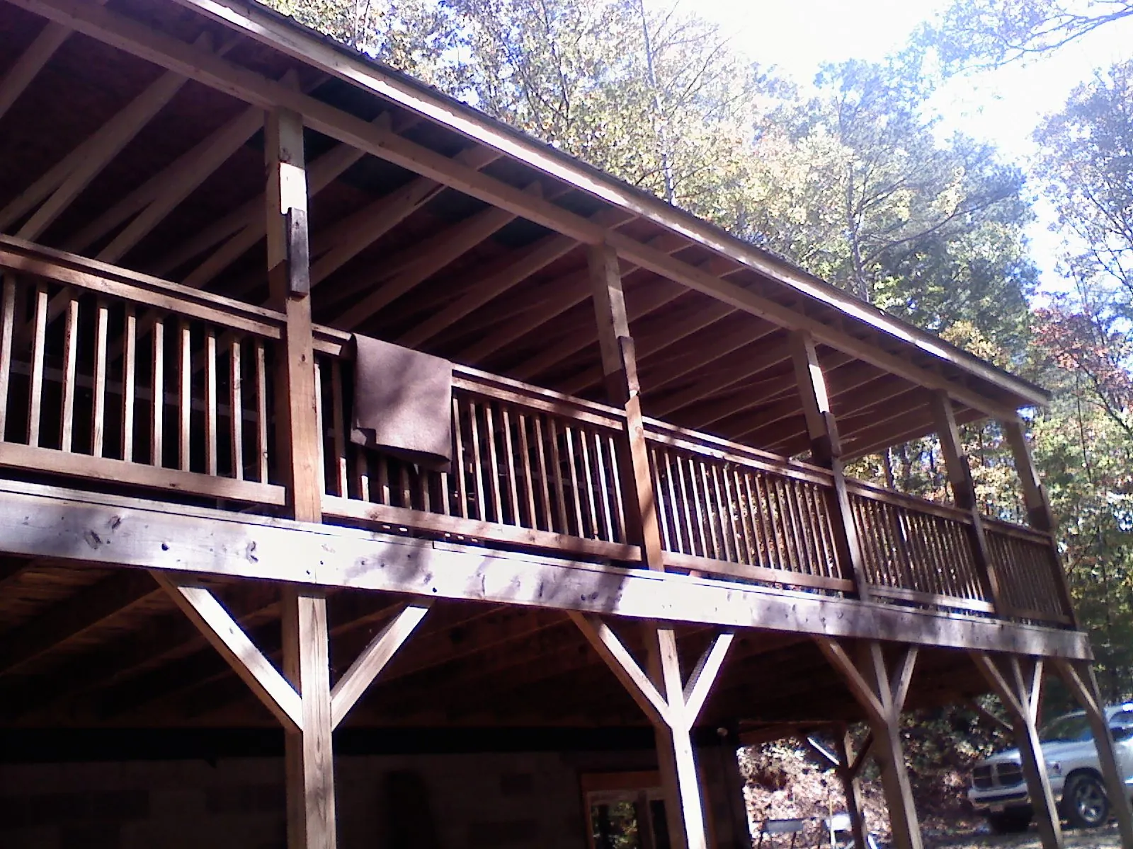 Timber framing under a new elevated porch and deck — Roof Leak Repair in Fitzwilliam by Roofing Brothers